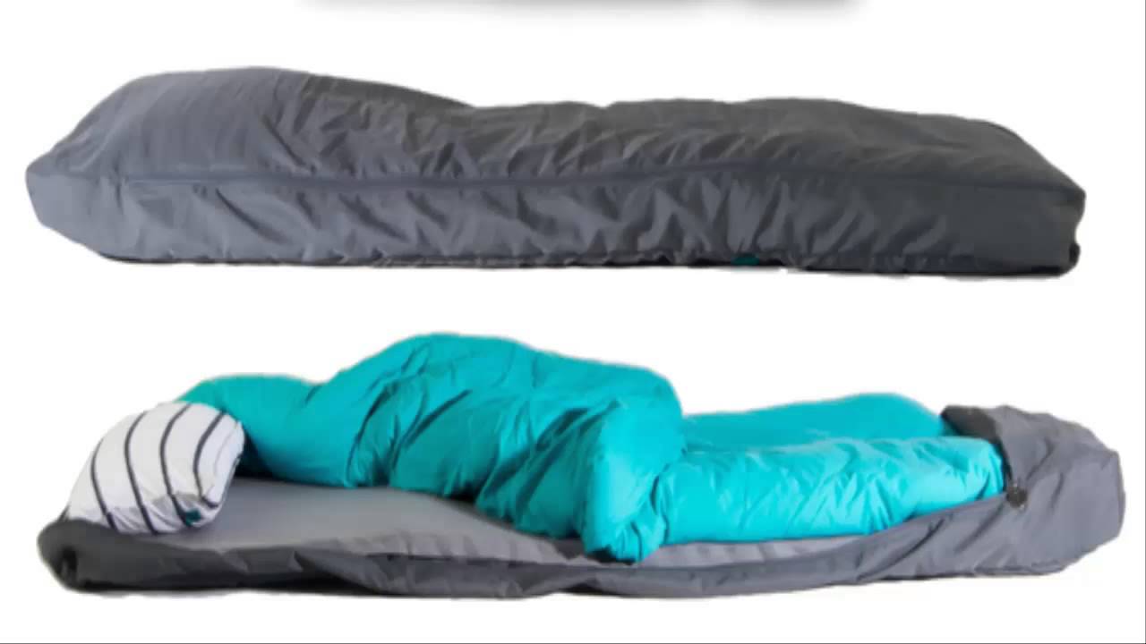 A Sleeping Bag With a Built in Air Mattress, Pillow, and Sheets Makes ...