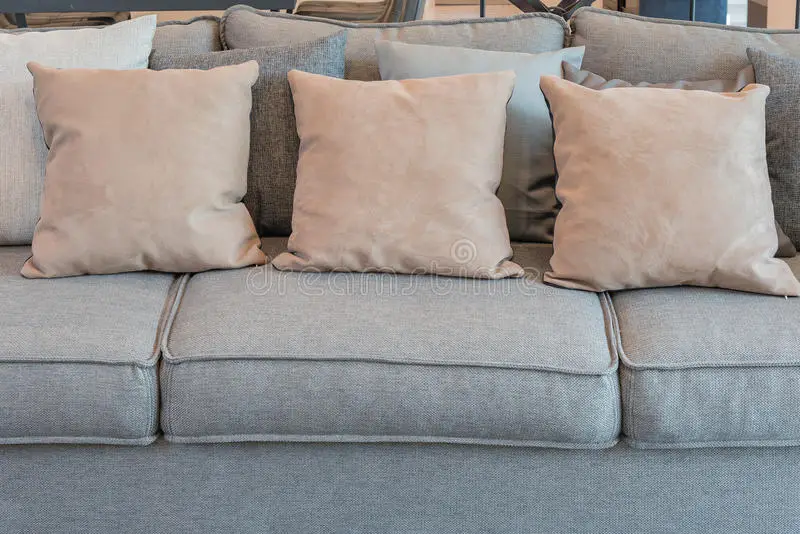 Pillows On Grey Sofa In Modern Living Room Stock Photo