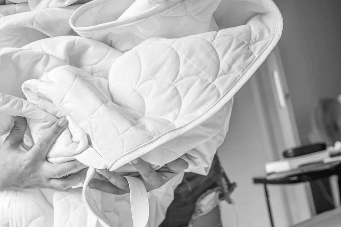 Should You Wash A Mattress Cover Before Using It?